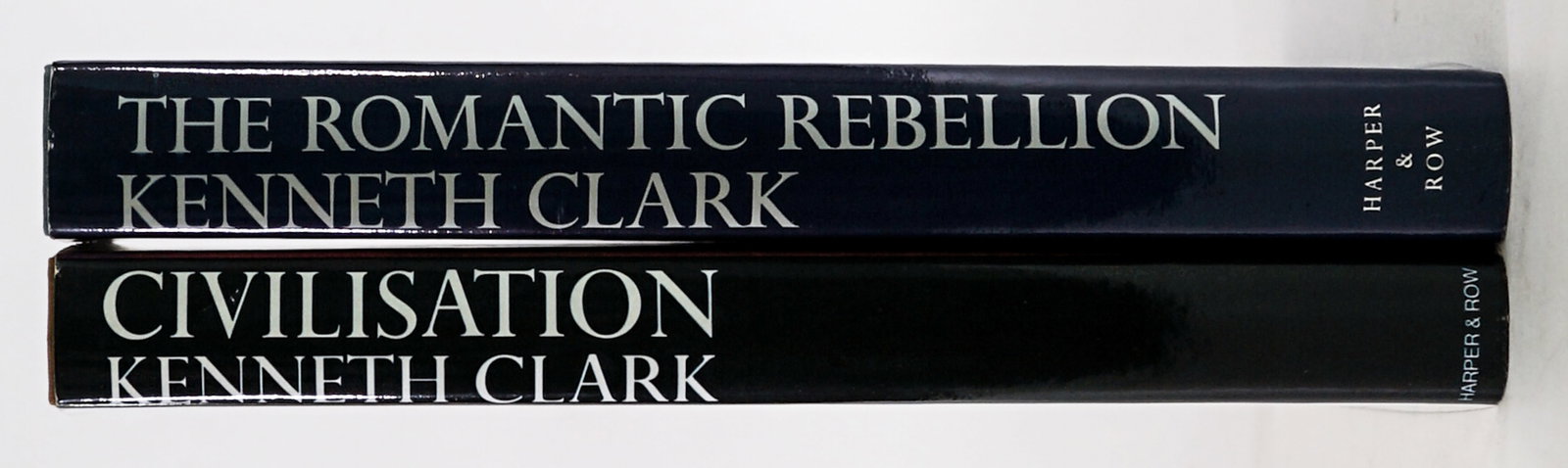 Kenneth Clark (2) Books [Harper and Row]: 1) The Romantic Rebellion 1973 1st with unclipped dust jacket. 2) Civilisation 1969 with unclipped dust jacket. Lot measures 10 in. H x 7.5 in. W x 2.5 in. D for shipping purposes only. The absence of