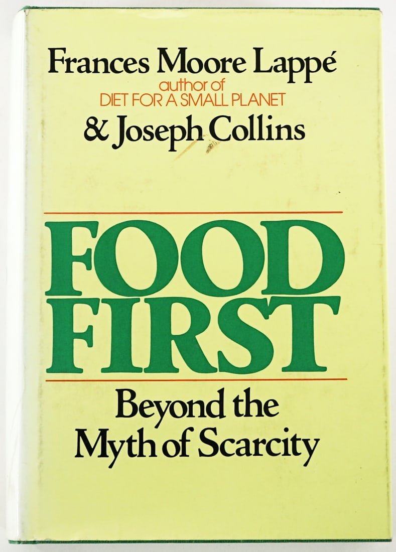 Food First by Frances Moore Lappe SIGNED 1977: Food First by Frances Moore Lappe (signed on front endsheet) and Joseph Collins. Houghton Mifflin 1977 with unclipped dust jacket. Green covers. Lot measures 8.25 in. H x 6.25 in. W x 1.5 in. D for