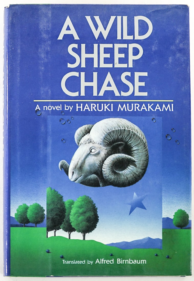 A Wild Sheep Chase by Haruki Murakami: A Wild Sheep Chase by Haruki Murakami. Kodansha International 1989 1st with unclipped dust jacket. Two tone covers. Lot measures 9.25 in. H x 6.25 in. W x 1.in. D for shipping purposes only. The absen