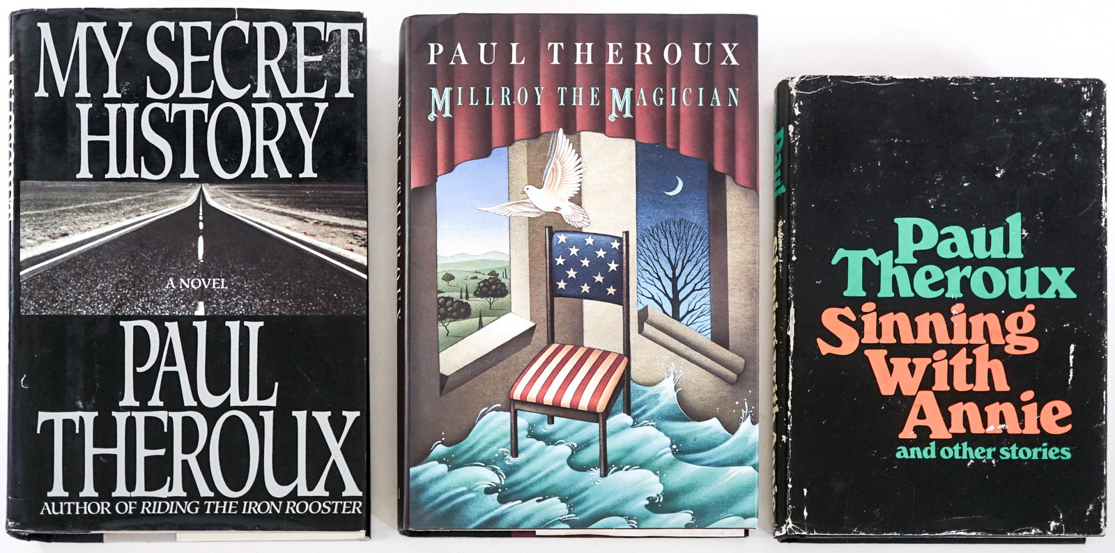 Paul Theroux (3) SIGNED Books: 1) My Secret History. G. P. Putnam's 1989. 2) Millroy the Magician. Random House 1994 1st. 3) Sinning with Annie. Houghton Mifflin 1972 1st. All signed with inscriptions, unclipped dust jacket. Lot me