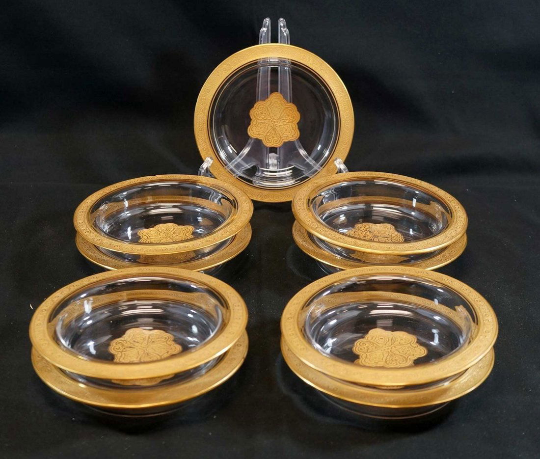 Moser Type Gilt Gold Bowls or Coasters (9): 6" x 1.25", eight are in good to very good condition with no cracks or chips and just some slight wear on a few. One has a small chip. From the collection of Alan and Pat Rypinski.