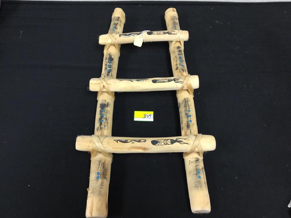 HANDCRAFTED NATIVE AMERICAN MINIATURE PUEBLO LADDER.: HANDCRAFTED NATIVE AMERICAN MINIATURE PUEBLO LADDER. SIGNED BY ARTIST. 23" x 12"