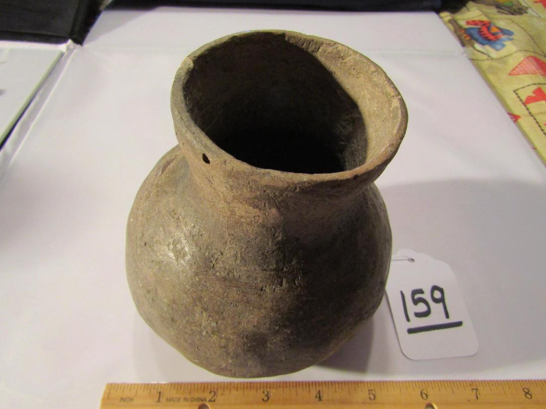 Bottle: 5" x 5 1/4" pottery bottle