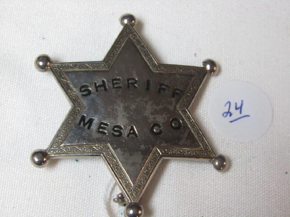 Badge: Sheriff Mesa Co. 6 point star