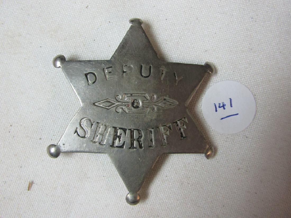 Badge: Deputy Sheiff, 6 point star, design center, What Cheer on Desc.