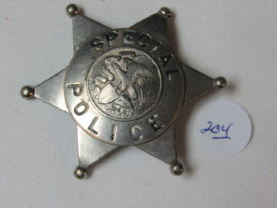 Badge: Special Police, 6 point star, eagle and shield in center