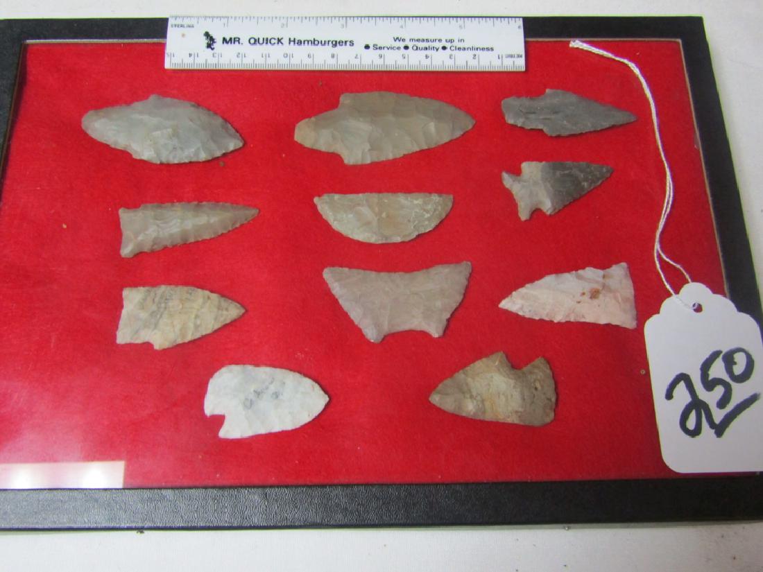 11 points: Frame with 11 flint including 2 crescents
