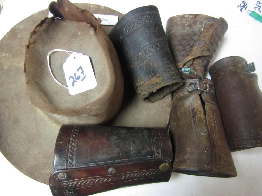 Hat/Cuffs: Old cowboy hat and 5 cuffs including 1 pair