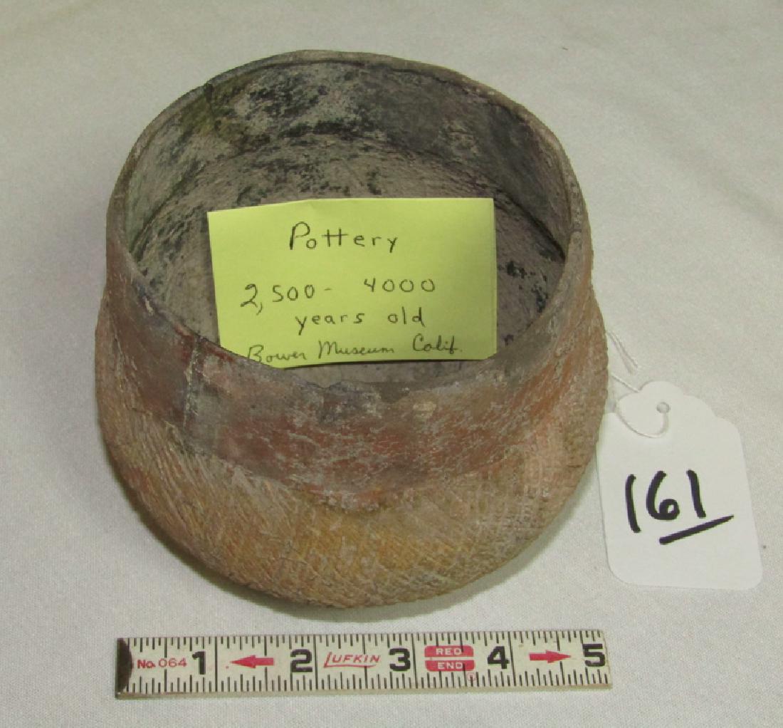 Ancient jar: Pre-Historic incised redware jar, 500 - 1000 BC, 4 3/4" x 4 3/4",