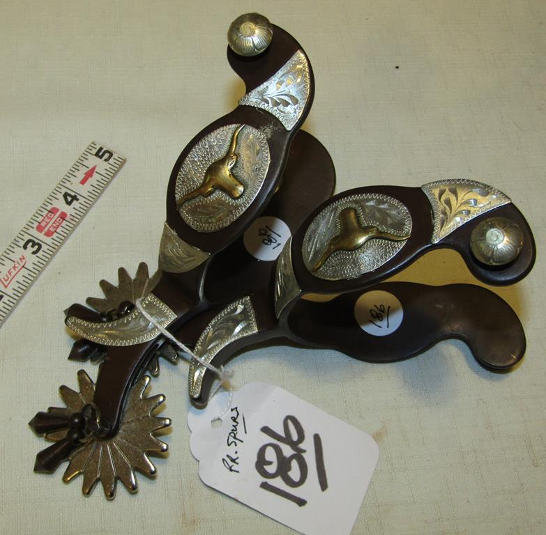 Spurs: Pr of jingle spurs with silver decoratioins and steer heads