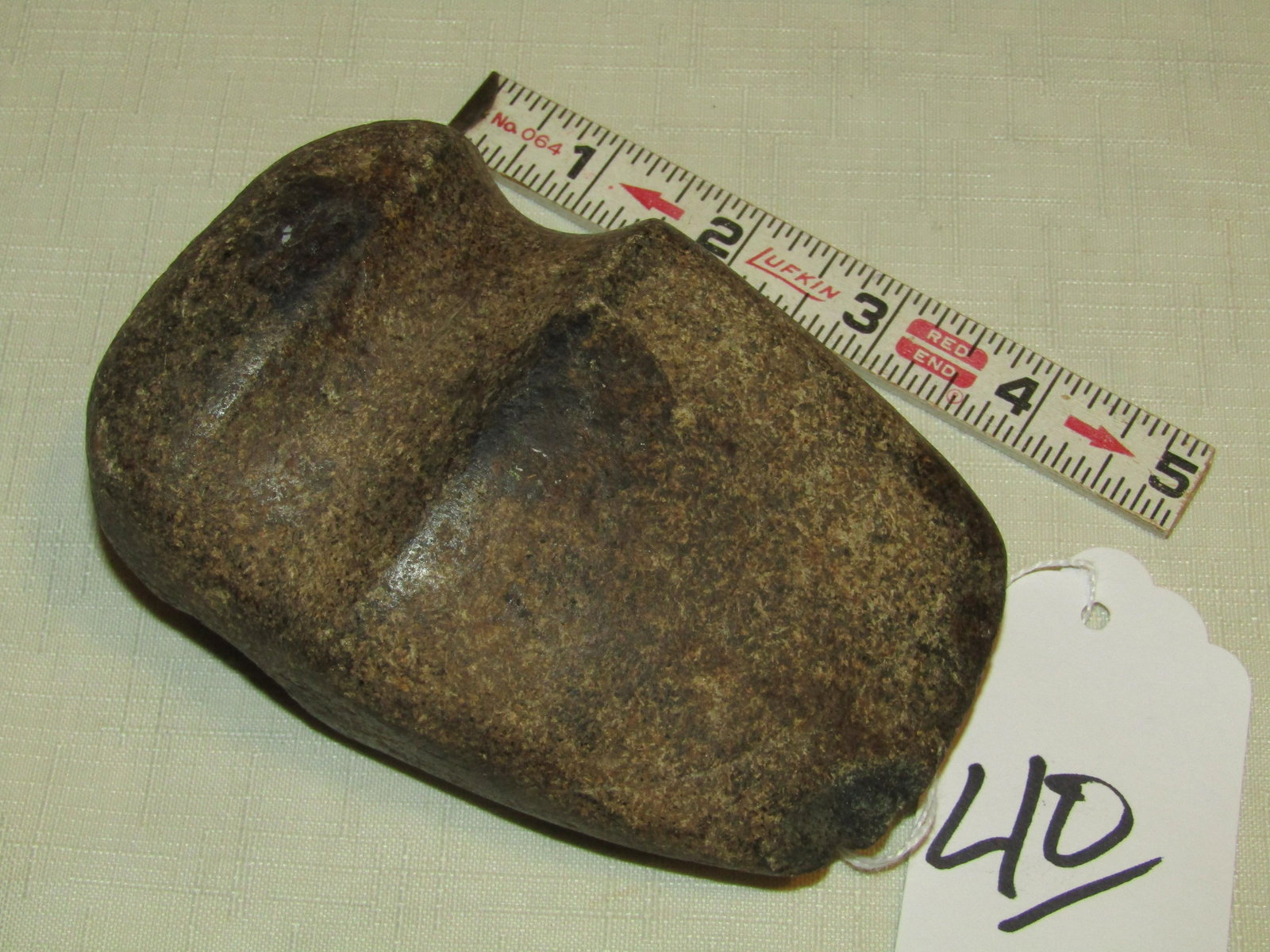 Axe: 4 3/4" axe, speckled brown, bit chips