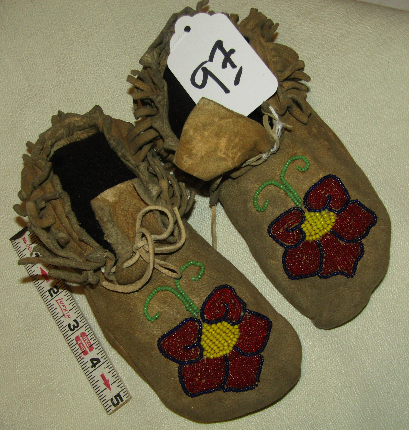 Cree mocs: Pr. Cree 7 3/4" beaded child's moccasins, cuff fringe, good cond. Ca. 1940