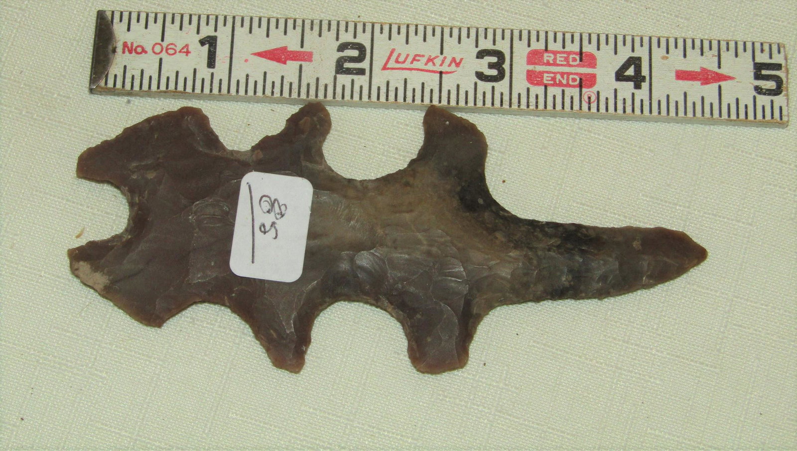 Flint eccentric: 4 3/8" dark brown flint eccentricd