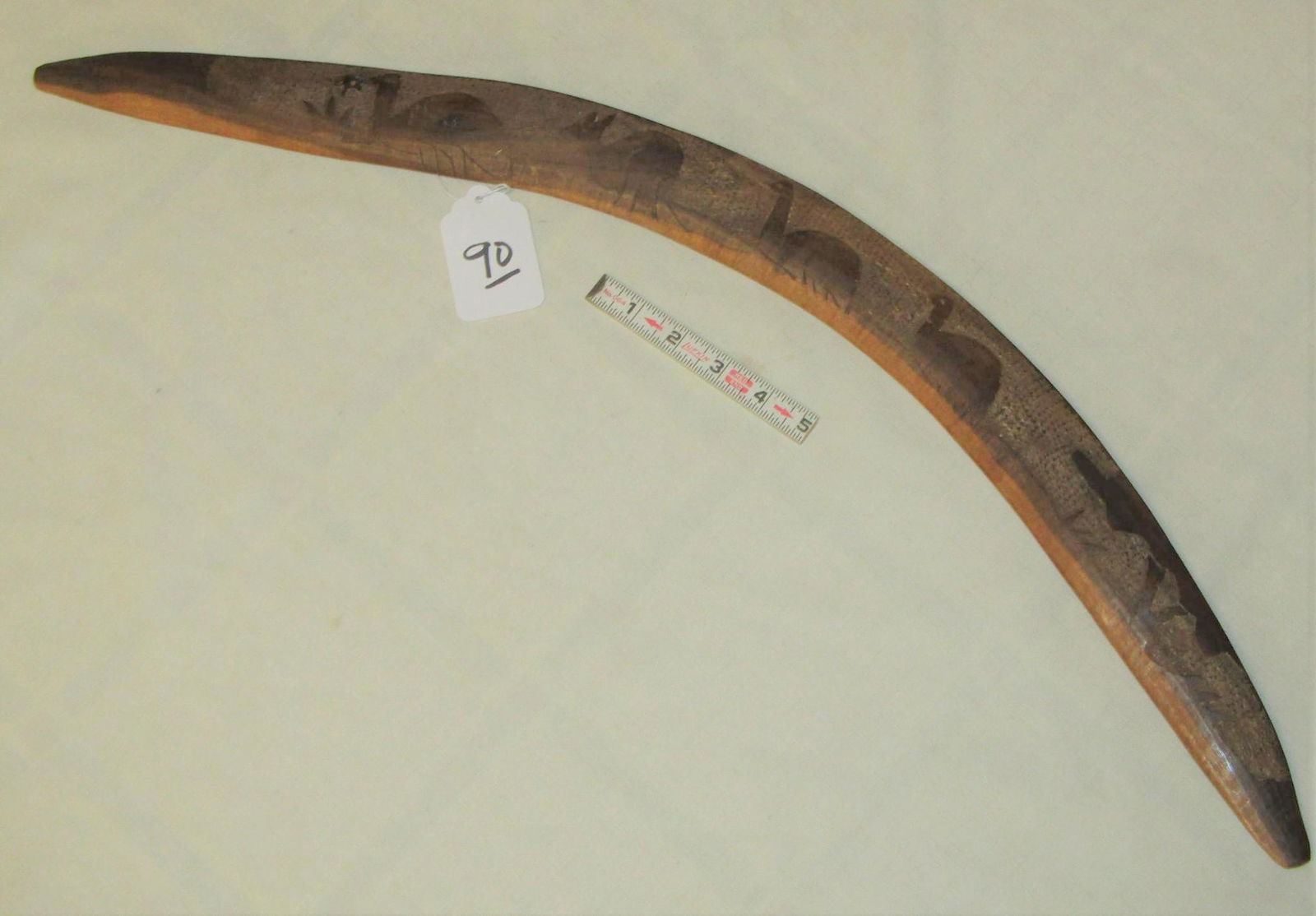 Boomerang: 28" Austrailian boomerang with animal effigys, good cond