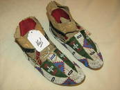 Plains 10" adult bead moccasins, sinew sewn, buffalo hide soles, good con. Ca. 19th century