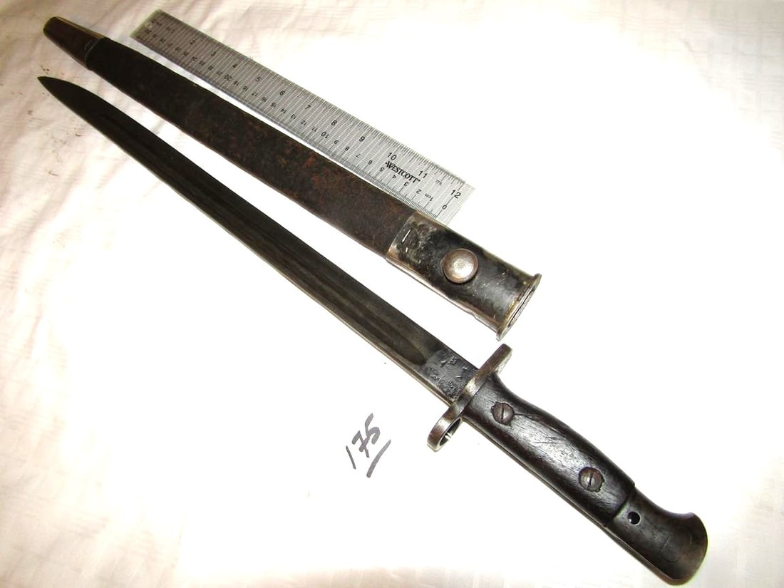 Bayonet: Unknown bayonet 22" with leather scabbard