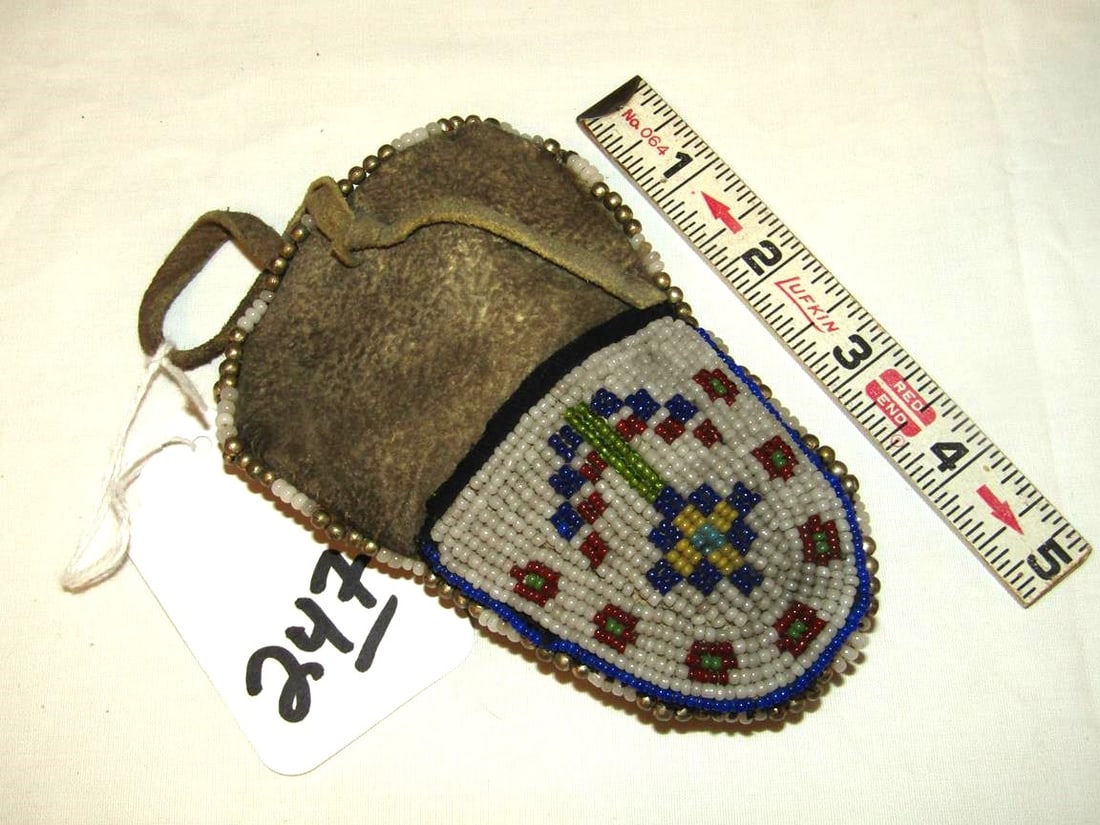 Pouch: Plains 5" hide beade moccasin toe pouch with brass beads, Good cond. Early 20th