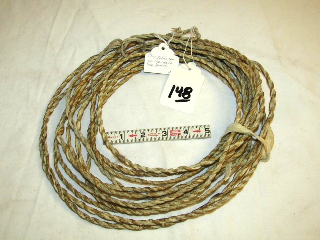Rope: Crow marked rawhide rope, good cond.