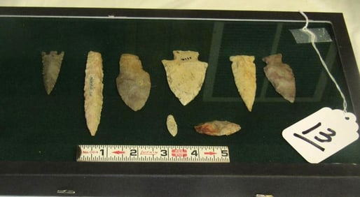 6 Arrowheads, 3 coins