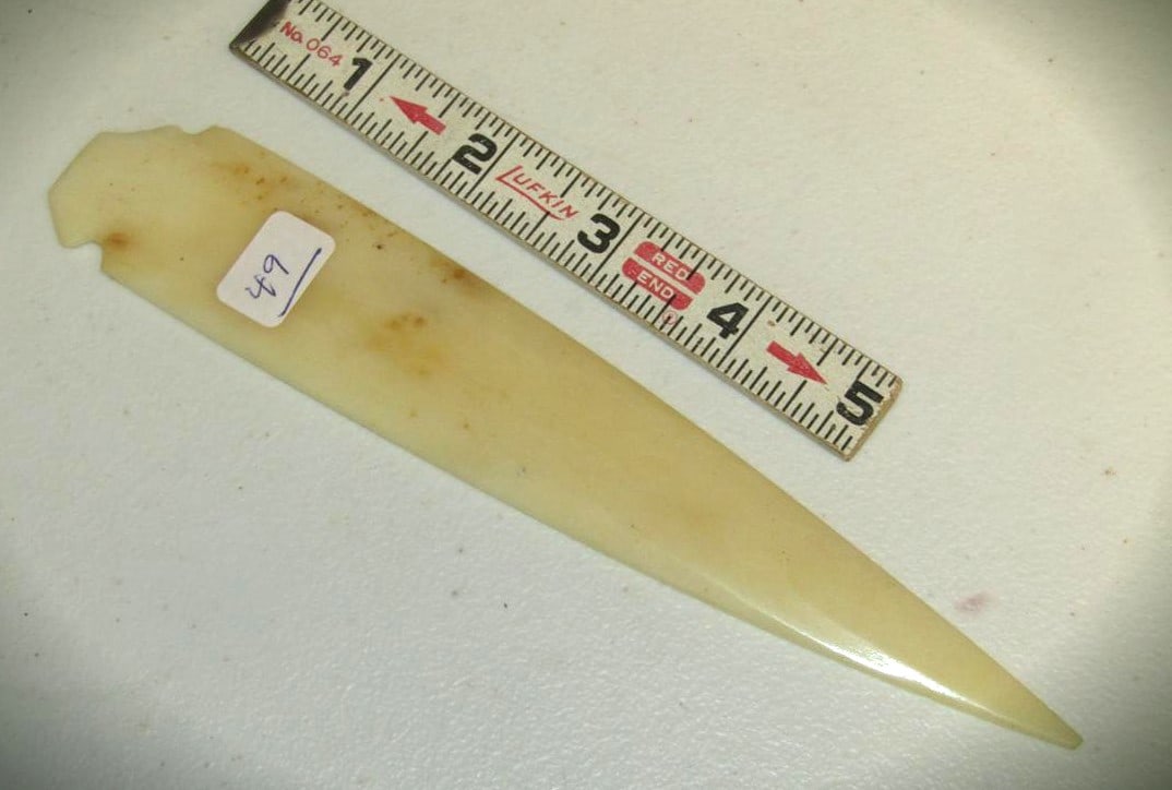 Arrowhead: Large 7 1/2" ivory point, very thin