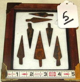 7 metal arrowheads