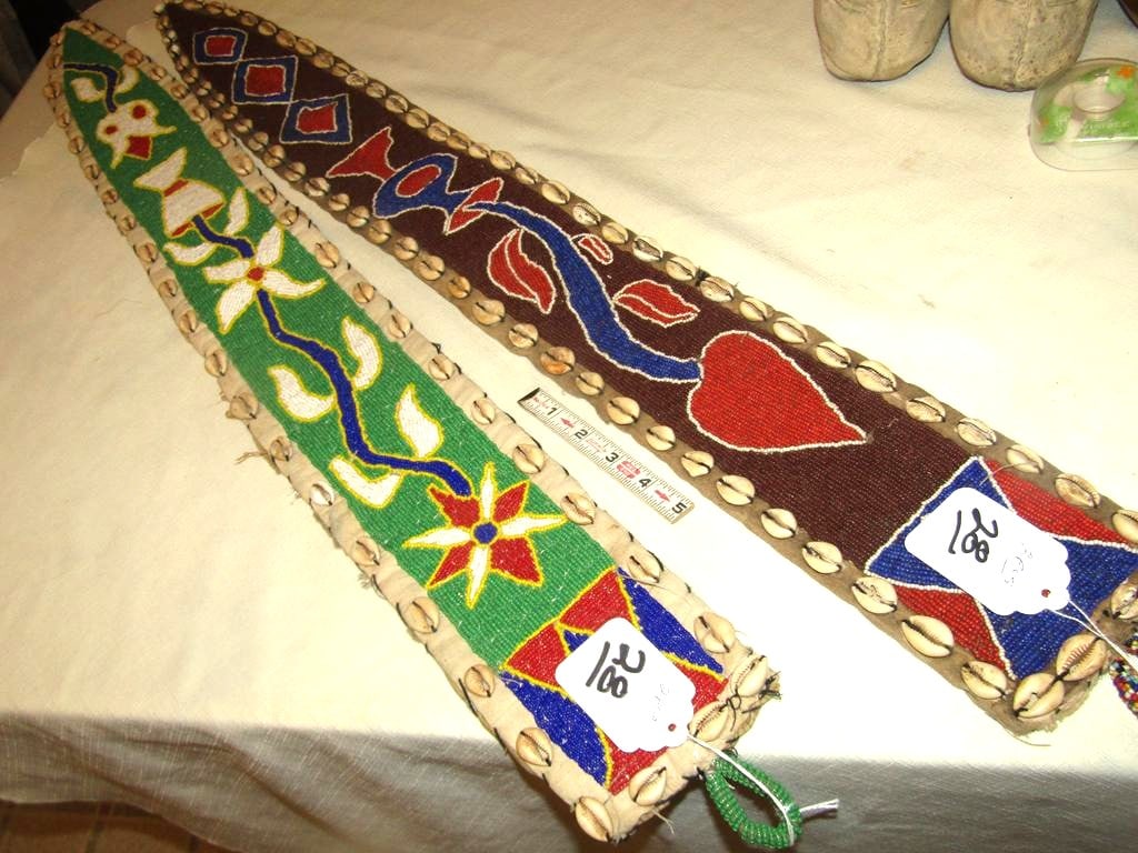 2 pcs.African: 2 pcs African 39" x 4 1/4" beaded strip, cowrie shell borders, 28" beaded panel, floral designs, very good cond