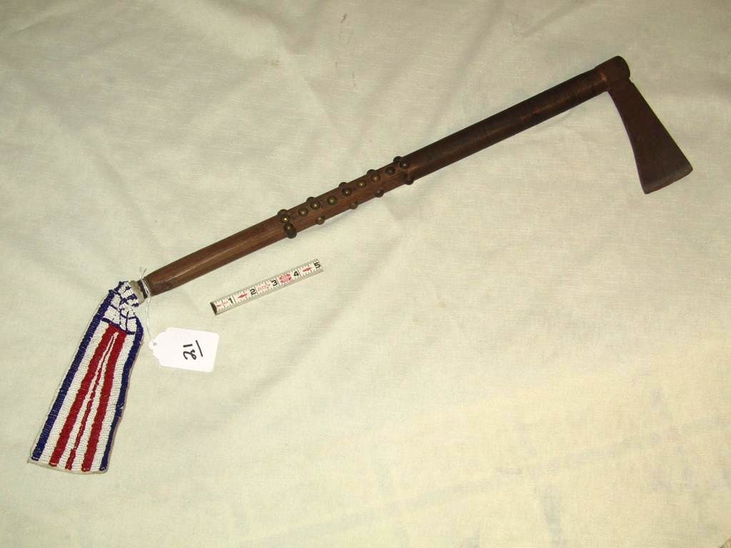 Tomahawk: Large Indian art 25" tacked tomahawk with beaded tassel, good cond