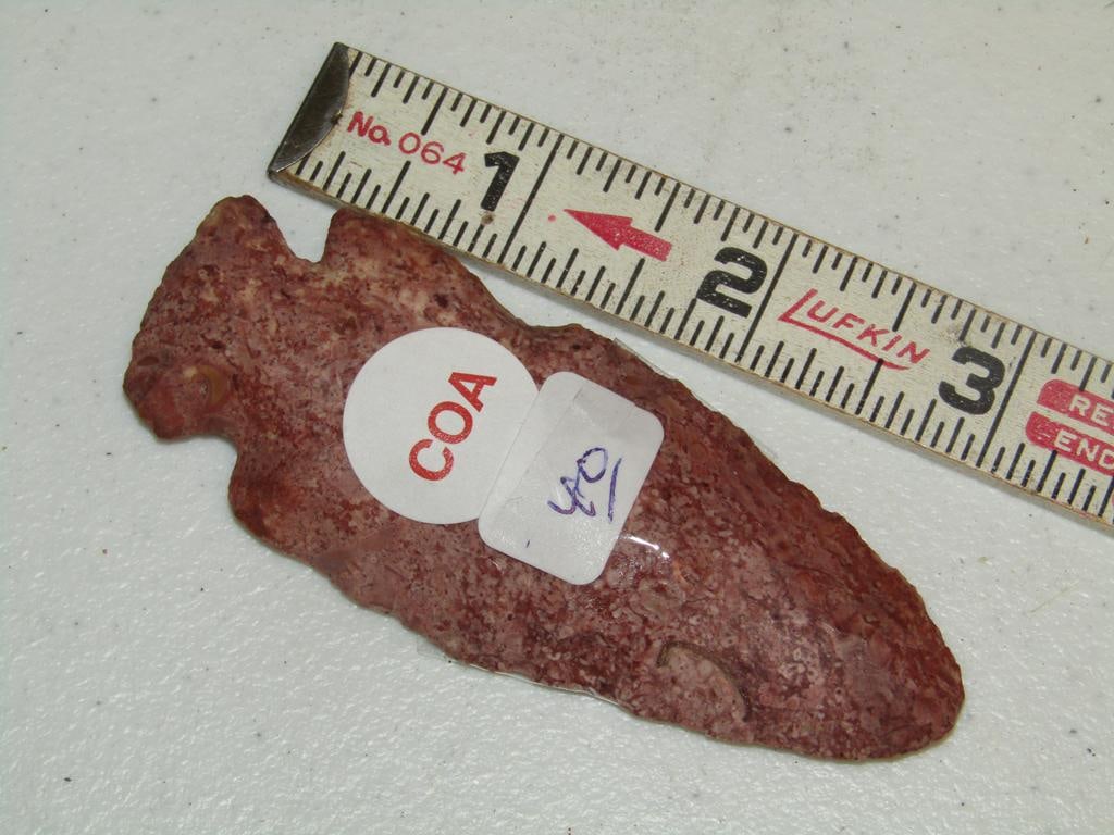 Motley coa: Motley coa 3 1/2" reddish bown Hopewell point, Missouri