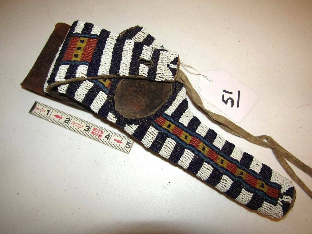 Holster: US leather Civil War emblem with later Cheyenne beaded holster, sinew sewn, good cond