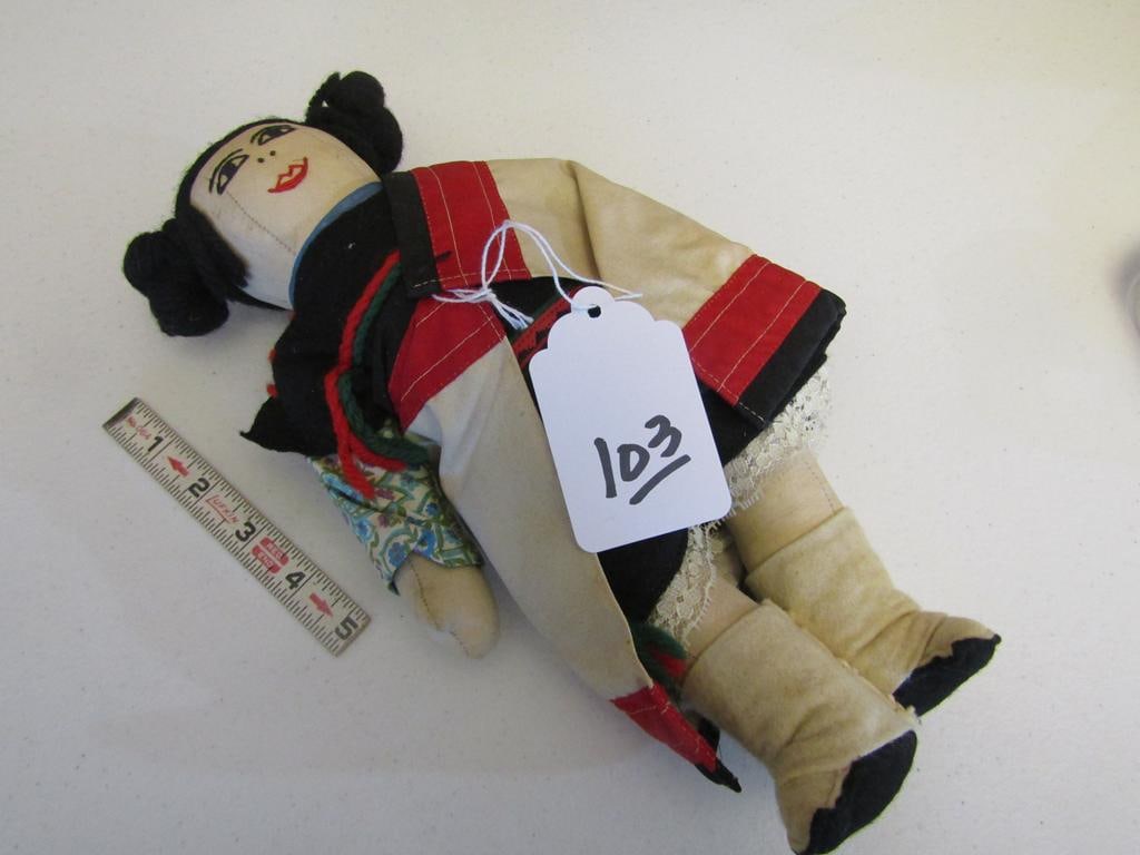 Doll: 12" leather dolll with yarn hair and face, clothing, good cond