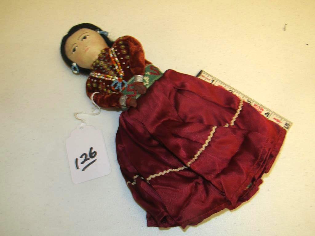 Doll: Navajo 12" doll with native clothing, beaded necklace and earrings, human hair, good condition