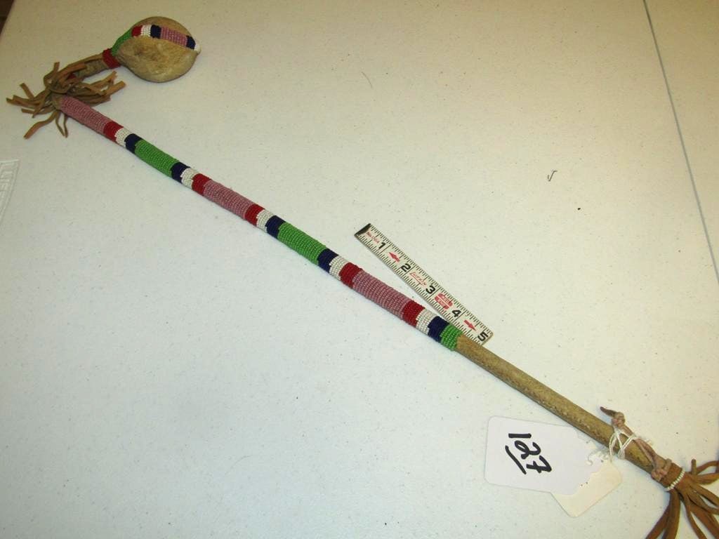 Club: Apache 30" stone beaded hide club and full bead handle, good condition