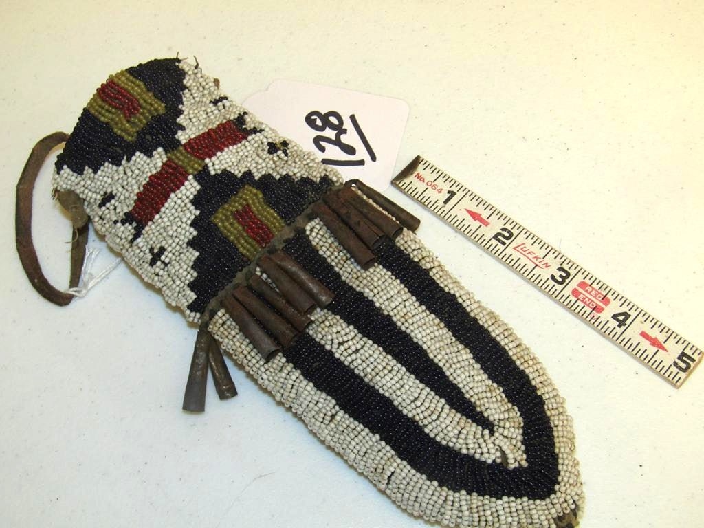 Knife case: Northern Plains 8 1/2" full bead knife case, few missing cones, sinew sewn, white heat red beads, good condition