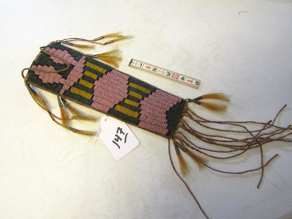 Knife case: Crow 11" beaded knife case with long fringe, cones, horse hair, sinew sewn, good condition