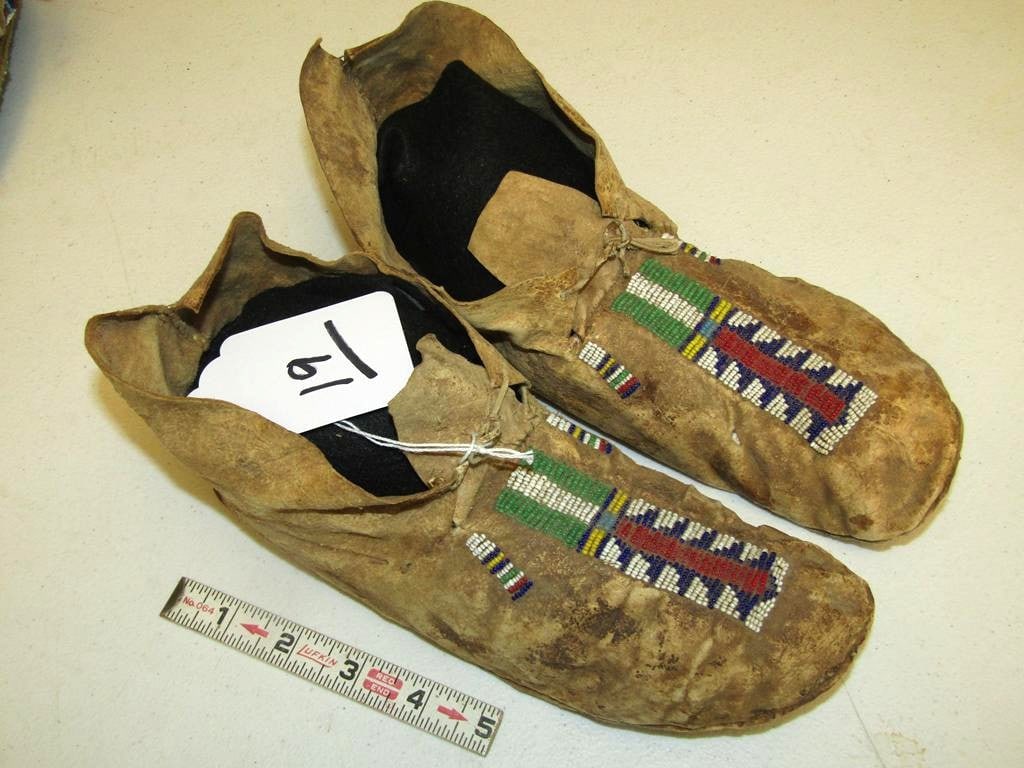 Moccasins: Cheyenne beaded 9 1/2" moccasins, sinew sewn, buffalo hide, good cond