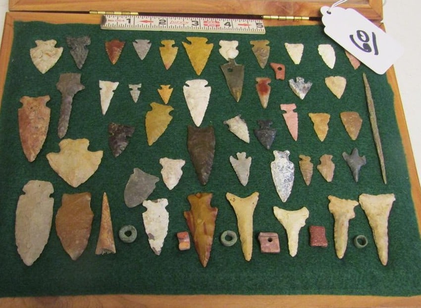 Numerous points: Wood display with numerous flint points, drills, beads etc