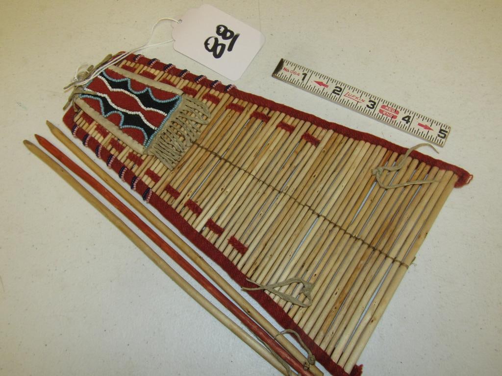 Tipi back rest: Plains 9 1/2" tipi backrest with beaded top, yarn edges, wooden slats, sinew sewn, good cond with tri-pod display