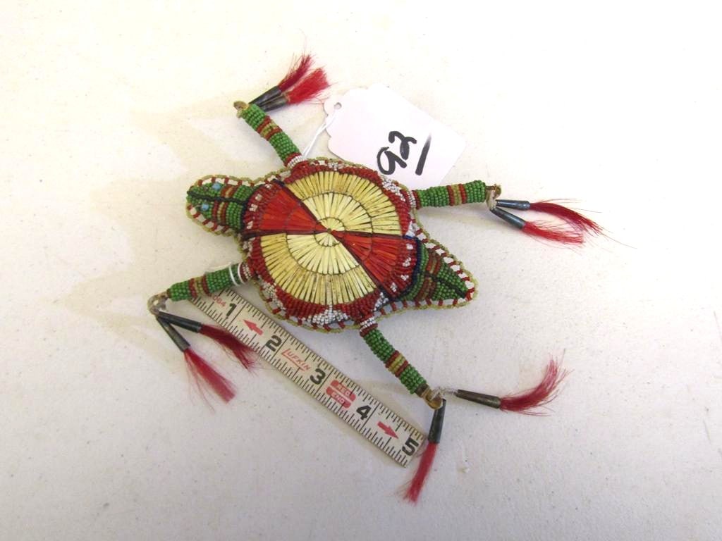 Fertish: Sioux 5 1/2" bead and quilled umbilical cord fetish, sinew sewn, cones, horse hair, feather decorated. good cond