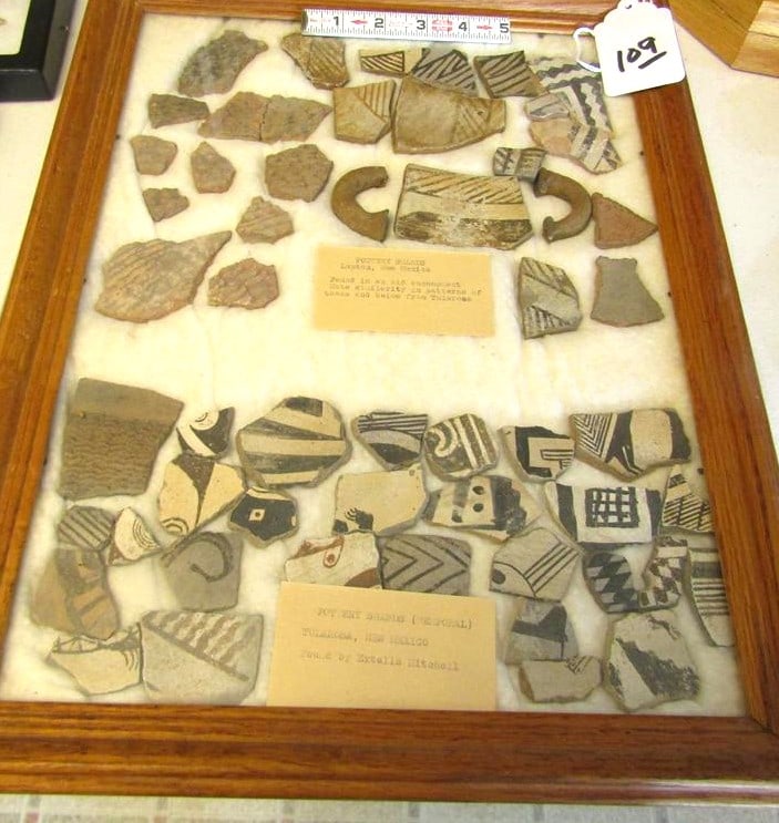 Pot sherds: Wood display with numerous painted pottery sherds etc with info