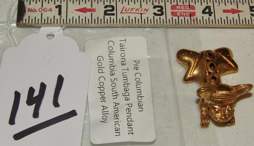 Pendant: 1 5/8" gold copper pendant with info