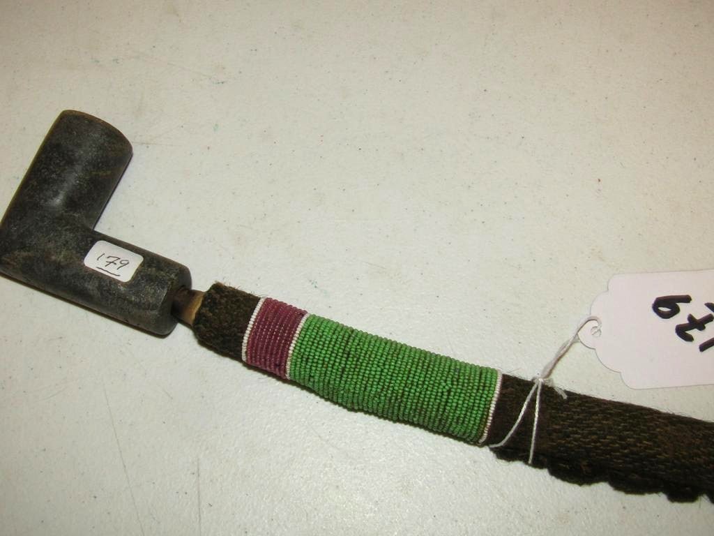 Pipe: 29" pipe with not original bowl, bead and cloth wrapped stem, sinew sewn fair/good cond