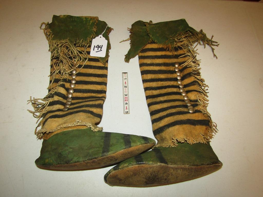 Moccasins: Comanche 10" high top moccasins, 18" tall, silver buttons, green ochre,black marks, fringe decorated, Rare, NS reserve not met last auction,