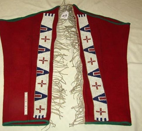 Leggings: Cheyenne red wood beaded leggings, 31 x 19" including side fringe, sinew sewn, very good/excellent cond