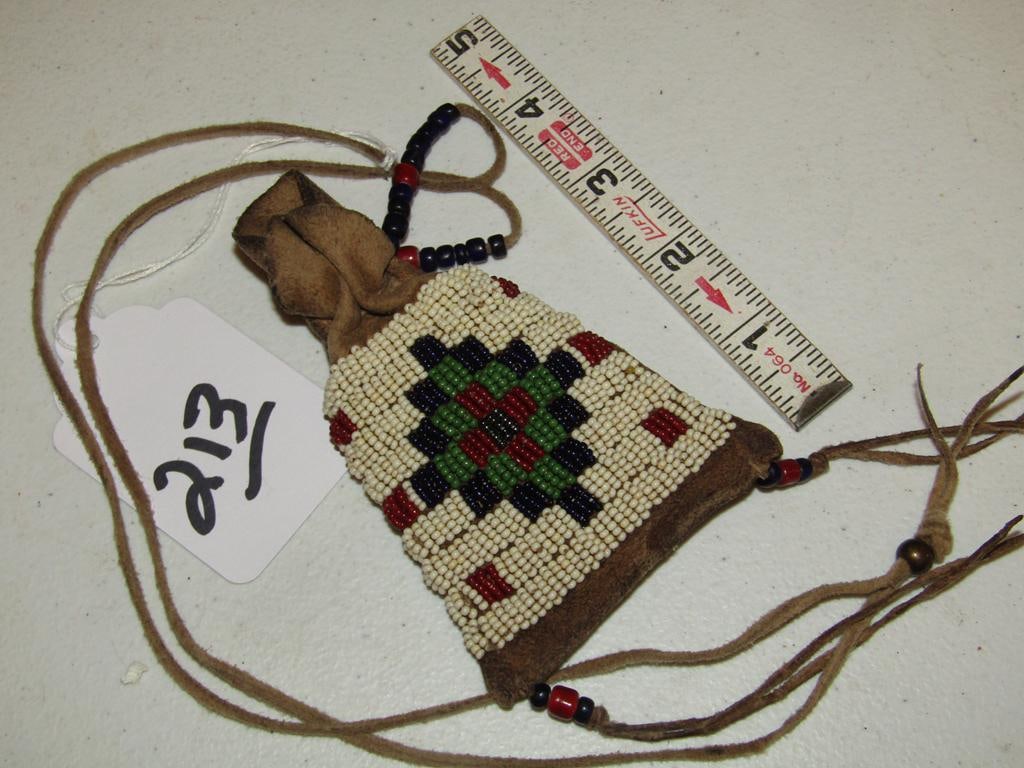 Medice pouch: Sioux 5" beaded medicine pouch with bundle, sinew sewn, trade bead on tassels, hide neck strap, good /very good cond