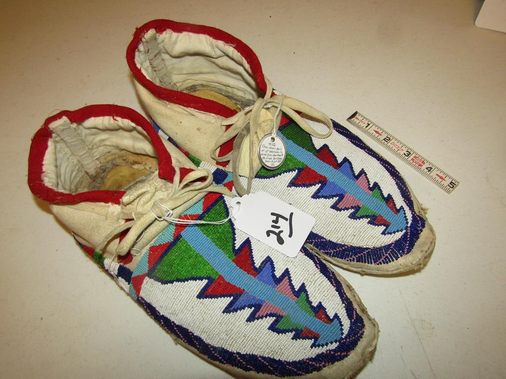 Moccasins: Large pair of Crow 13" fully beaded moccasins, resoles, painted parflerch soles, toe separations, sinew sewn good cond