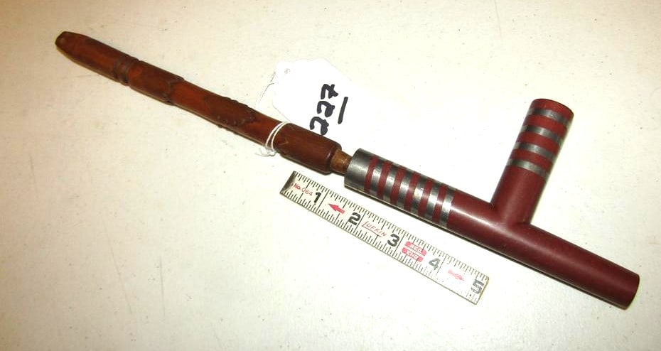 Pipe: Sioux 10 1/2" pipe with caved and decorated wood stem, 6" catlinite pewter designed pipe bowl, good cond