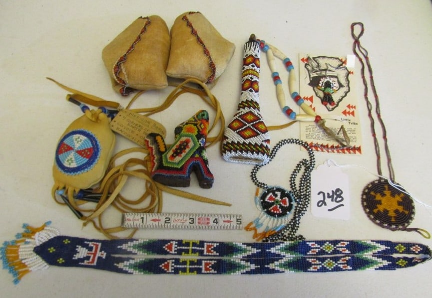 Misc items: Plastic container with appx 8 pc misc beadwork items,