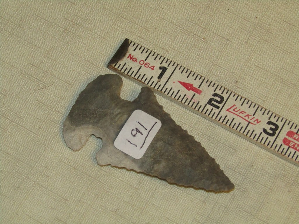 Point: 2 7/8" Thebes point, gray and cream colored, not examined for coa
