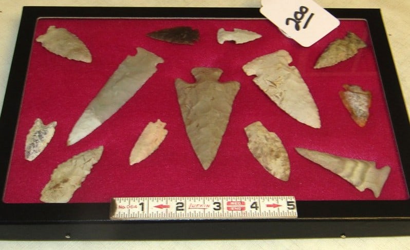13 points: Display with 13 various points, largest is 4 1/2", not examined for coa's
