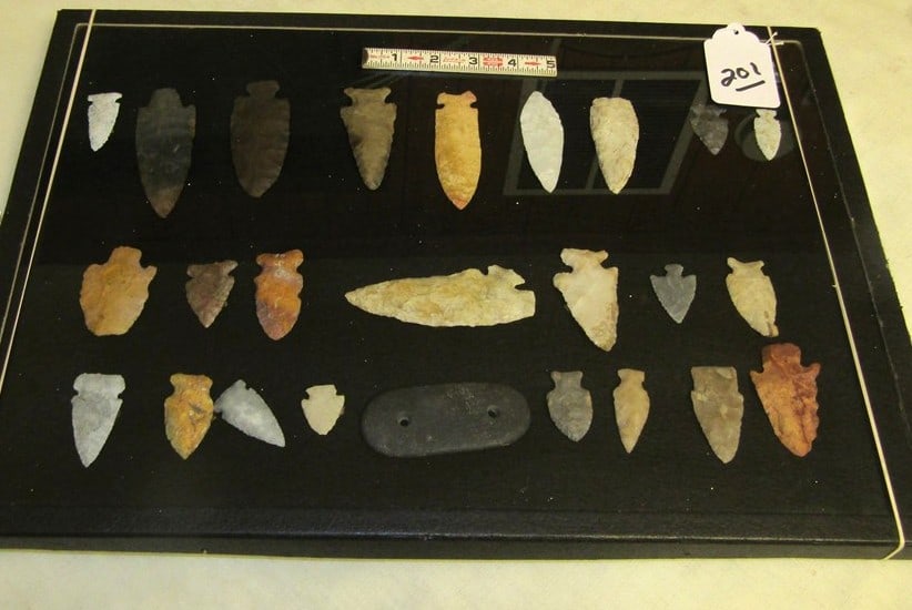 25 points: Large display with 25 various points, tools and gorget, largest 4 1/4", not examined for coa's